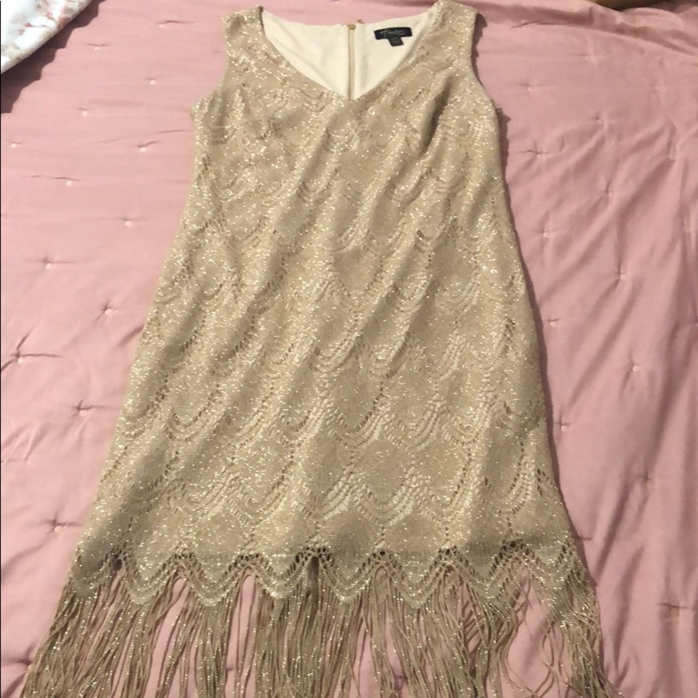 Thalía Sodi Gold Roaring 20s like dress